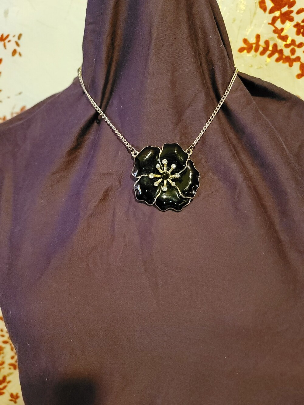Delicate Black Enamel Flower Necklace On A Gold Tone Adjustable Chain